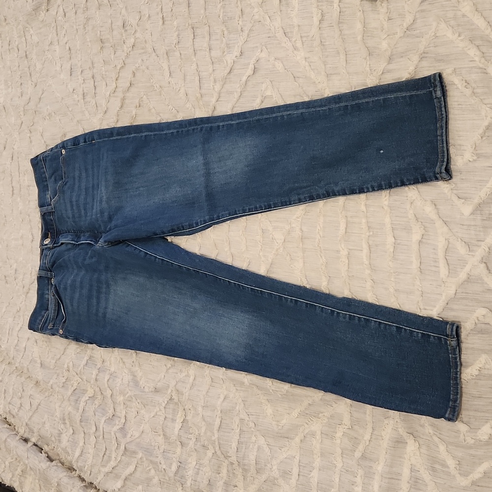 Medium wash high waist, hyper stretch skinny jeans size 14!